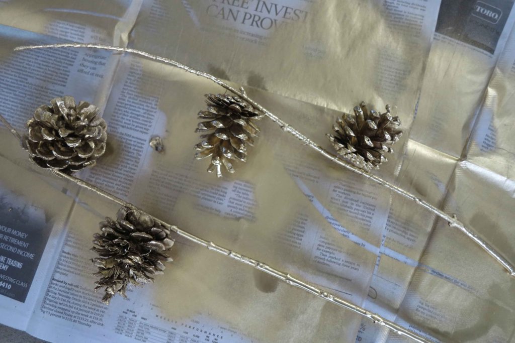 spray painted pine cones