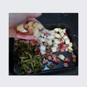 making roasted potatoes and hot dogs