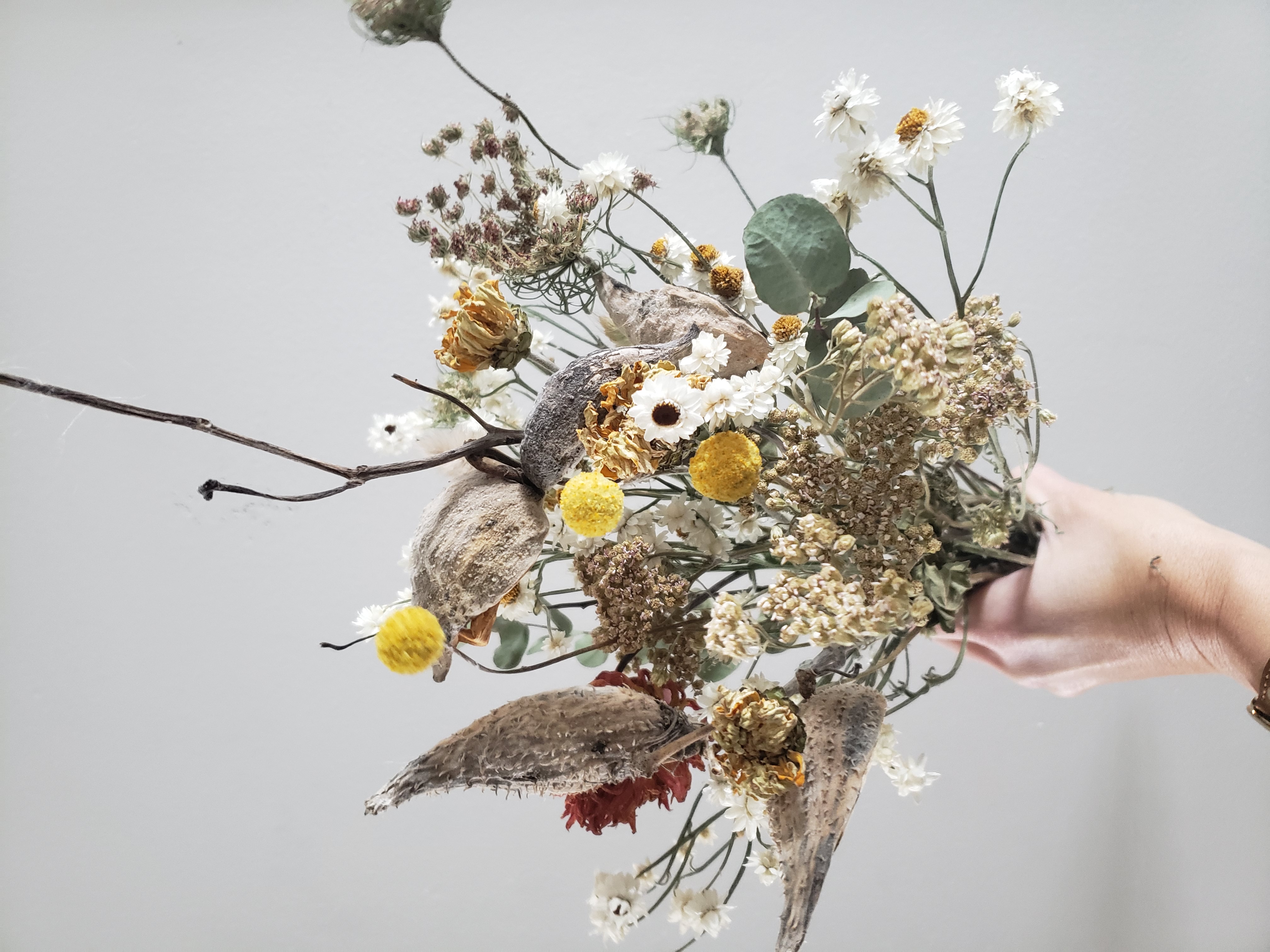 white and yellow dried bouquet