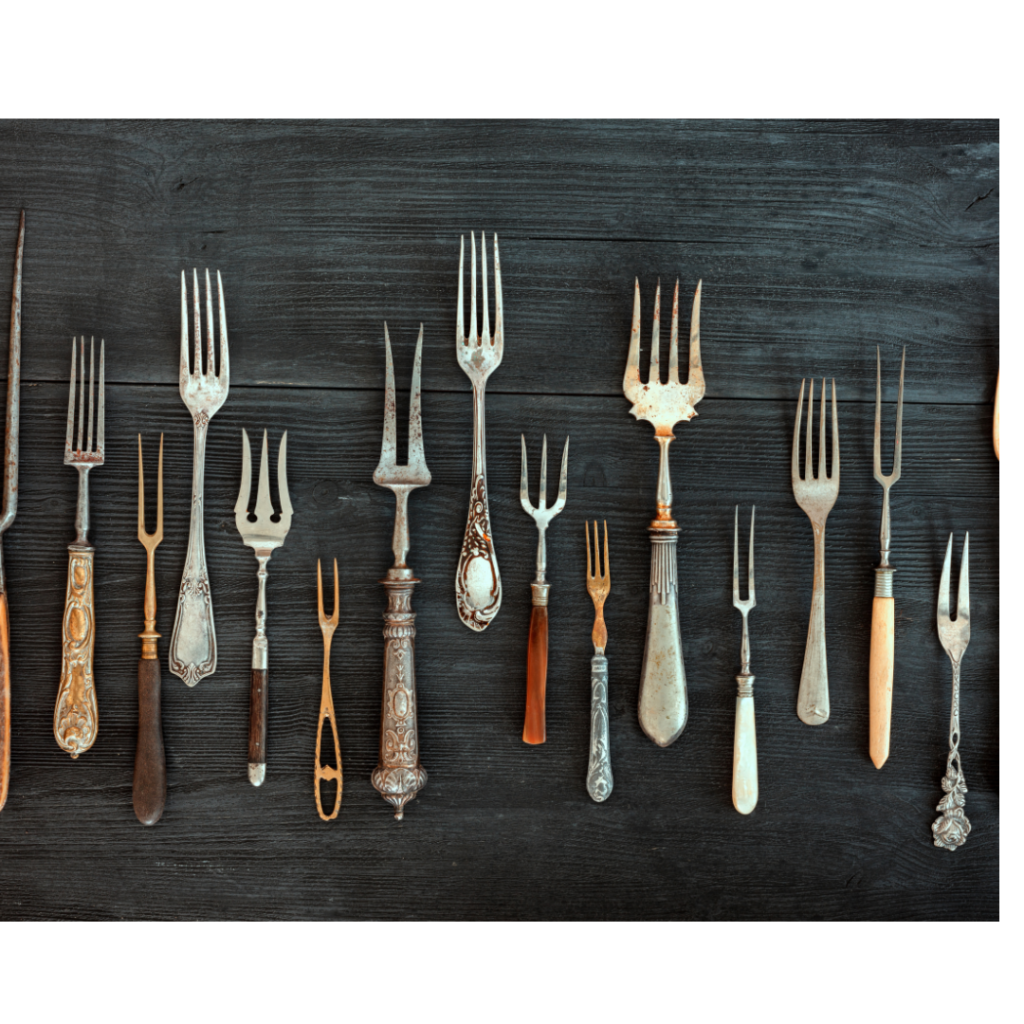 Display of vintage forks Collection of vintage serving forks